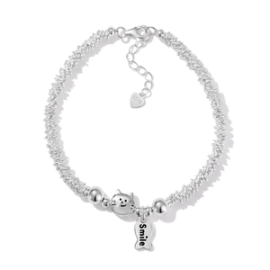 S925 sterling silver bracelet featuring a cat smile charm and small fish pendant