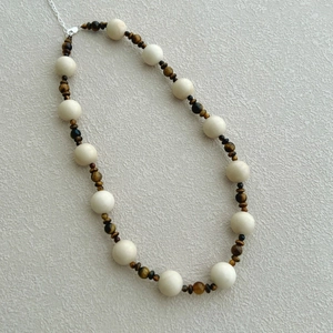 Elegant S925 silver necklace with matte white beads and natural tiger eye stones