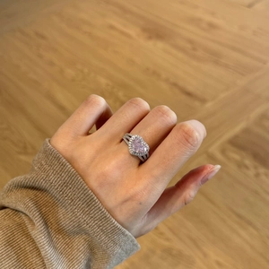 S925 sterling silver heart-shaped pink diamond ring with halo setting on finger