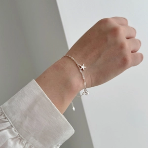 Bracelet chaîne trombone en argent S925 avec pendentifs étoile polie et carré texturé