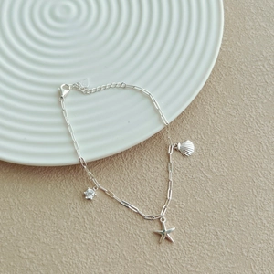 Détails des breloques en argent S925 avec étoile de mer, coquillage et zircon