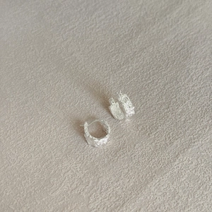 Minimalist S925 sterling silver hoop earrings with a textured hammered finish for women