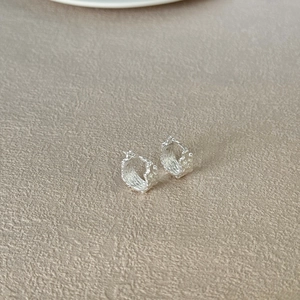 Modern S925 sterling silver hoop earrings with unique molten texture and matte finish