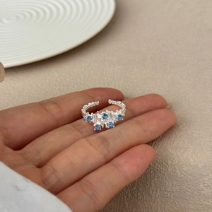 S925 sterling silver ring with blue glacier zircon crystals worn on hand