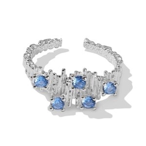 Adjustable S925 silver ring featuring irregular textures and five blue zircon gemstones