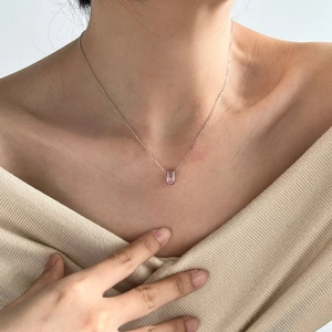 Exquisite S925 sterling silver necklace with pink baguette zircon pendant on a model