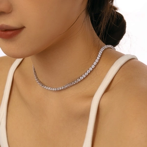 Close-up of 4mm silver S925 sterling silver tennis necklace with clear round zircons