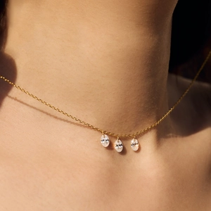S925 sterling silver necklace with three oval gemstones on a delicate gold chain