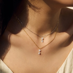 Elegant S925 sterling silver layered necklace with teardrop and round zircon pendants