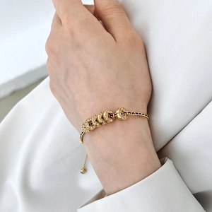 Elegante bracciale in argento S925 con ciondoli a moneta e perline nere di lusso
