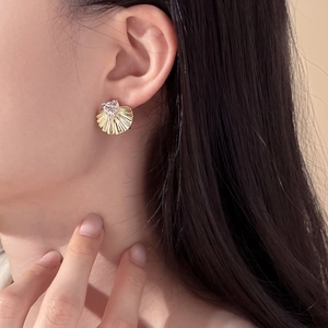 S925 silver fan-shaped earrings with heart-shaped zircon shown on female ear
