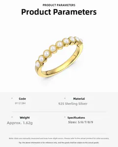 Detail of S925 sterling silver ring with gold finish and horizontal pearl row