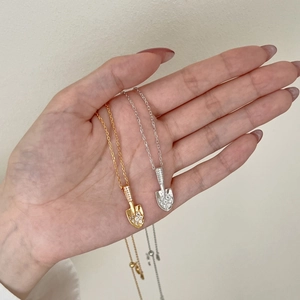 S925 sterling silver shovel pendants with pave crystals in gold and silver finish