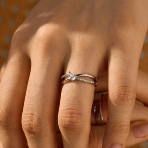 Elegant S925 sterling silver ring with water drop gemstone and criss-cross diamond band