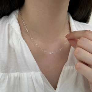 Elegant S925 sterling silver necklace featuring delicate embossed heart-shaped links
