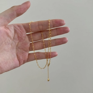 Elegant 18K gold S925 sterling silver necklace featuring a unique heart-shaped link chain