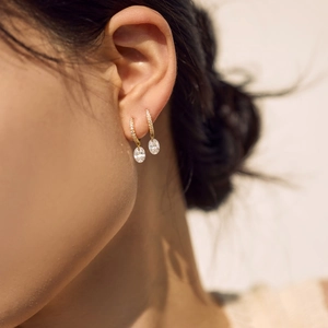 Elegant gold S925 sterling silver hoop earrings with oval-cut dangling gemstones