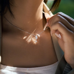 Elegant S925 sterling silver marquise pendant necklace worn by a model in natural light
