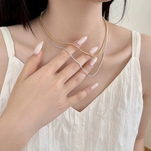 Collana minimalista in argento sterling S925 con perline in finitura oro e argento