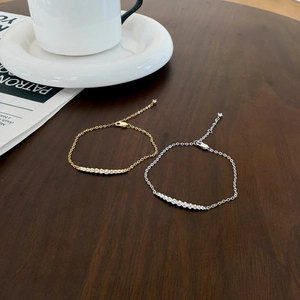 Bracciale sorriso in argento 925 con zirconi a gradiente, finiture in oro e argento elegante