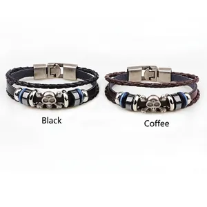 Punk multi-layer woven leather bracelet set with metallic skull charms in black and brown