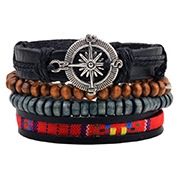 Detail of multi-layer bracelet with compass charm, leather straps and ethnic woven beads
