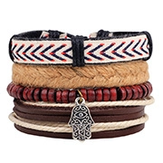 Detail of multi-layer ethnic bracelet with wooden beads and engraved Hamsa Hand charm