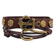 Macro shot of retro leather bracelet with bronze anchor clasp and star rivets on plain white background