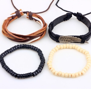 Ensemble de bracelets bohèmes avec cuir tressé, ailes en métal et perles en bois