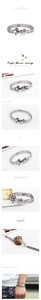 Detail view of retro silver metal link bracelet featuring a galloping horse charm