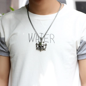 Men's vintage skull anchor pendant necklace with silver box chain worn on neck