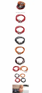 Detail van de meerlaagse lederen armband met metalen D-sluiting en 41cm lengte-indicator