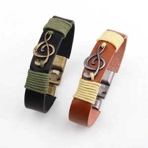 Vintage leather musical note bracelets with braided cords and metal treble clef charms