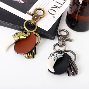 Vintage elephant resin ivory keychain with leather strap and bronze metal accents