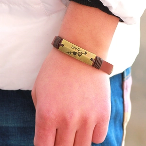 Retro brown braided leather bracelet with Love metal plate and Cupid arrow design