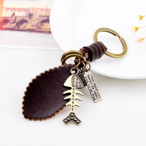 Retro punk fish bone keychain with genuine leather leaf pendant and vintage bronze accents