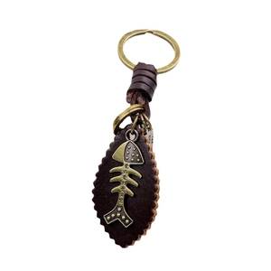 Vintage leather fish bone keychain with engraved bronze metal charm and braided strap