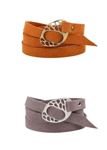 Detail of grey and orange wrap bracelets with hollow metal buckles on suede bands