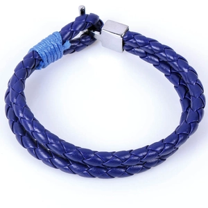 Detail view of navy blue double-layer braided leather bracelet with silver metal buckle