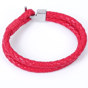 Detail of red braided leather bracelet featuring a silver square hook buckle clasp