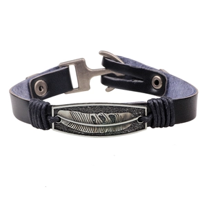 Vintage black leather braided bracelet with an antique silver feather metal plate
