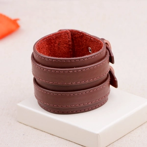 Wide double-layered dark brown genuine leather cuff bracelet with rustic stitching and snap button