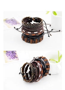 Detailed view of layered men's vintage woven leather bracelets with adjustable knots