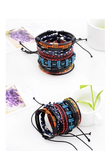 Close-up of stacked colorful braided leather bracelets with adjustable pull strings