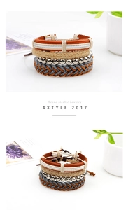 Dettaglio di un set di 4 bracciali vintage con pelle, corda di juta e perline