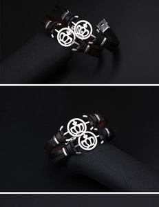 Detail of vintage leather crown bracelets in black and brown on display stands