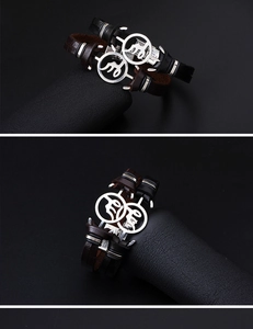 Macro view of braided leather bracelets with stainless steel anchor clasps in black and brown