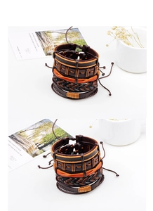 Macro detail of men's vintage brown multilayer leather braided bracelets with wooden beads
