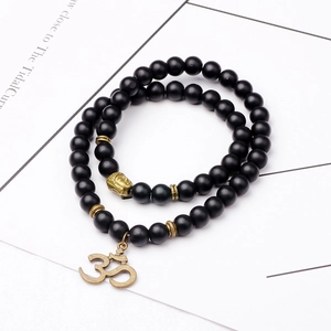 Bracelet ethnique double couche en perles noires mates avec tête de bouddha et pendentif Om