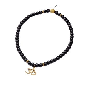 Bracelet ethnique en perles noires mates avec tête de Bouddha dorée et pendentif Om